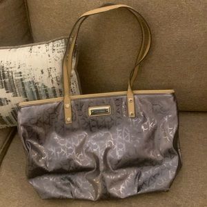 Calvin Klein Monogrammed Metallic Zippered Purse